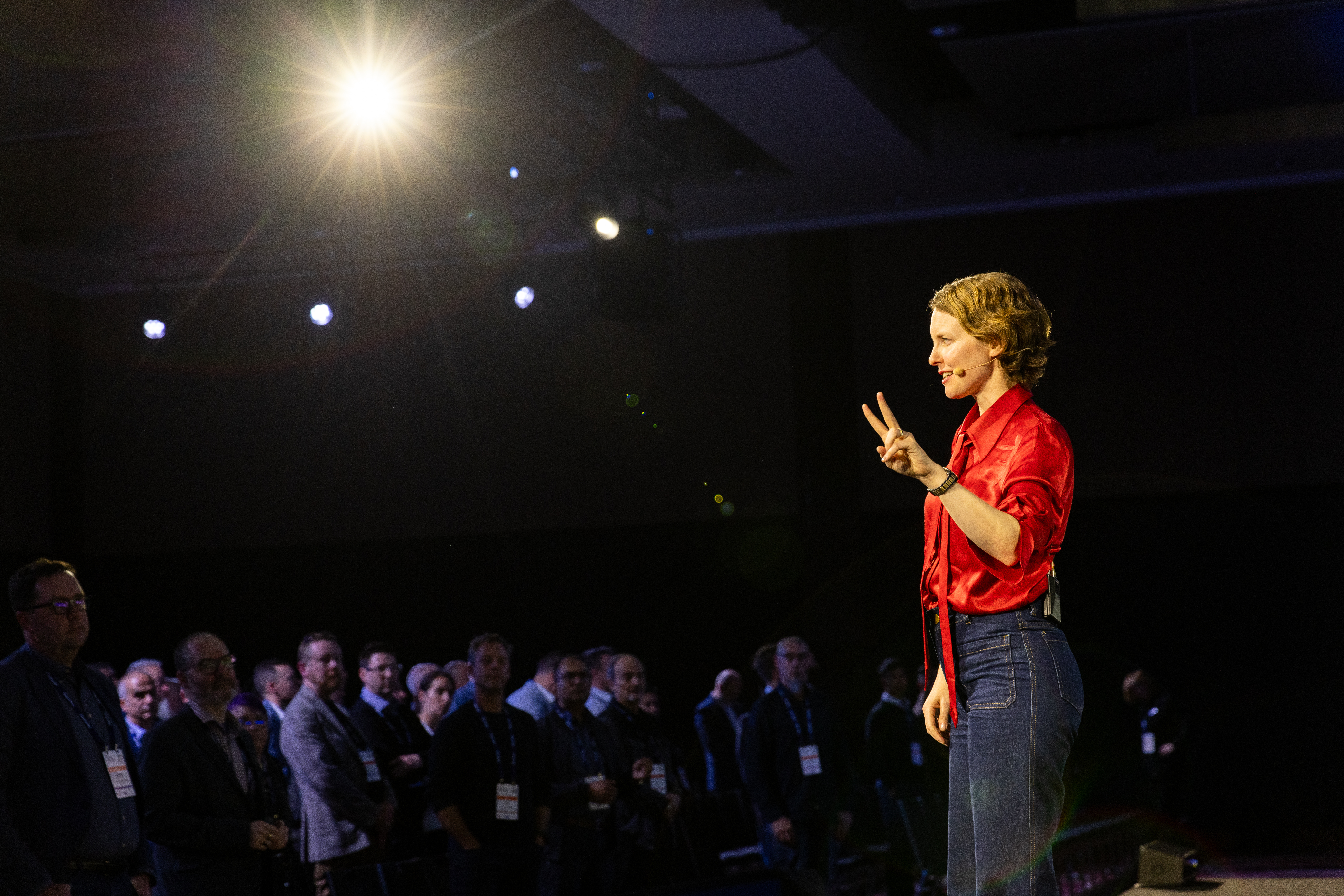 Michelle Rushton presenting to a standing audience